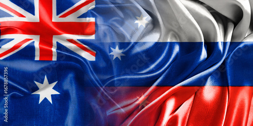The national flags of Russia and Australia are combined into one and placed side by side on a fluttering cotton background. Flags.