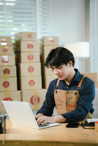 Small business owner, Chinese man working with boxes