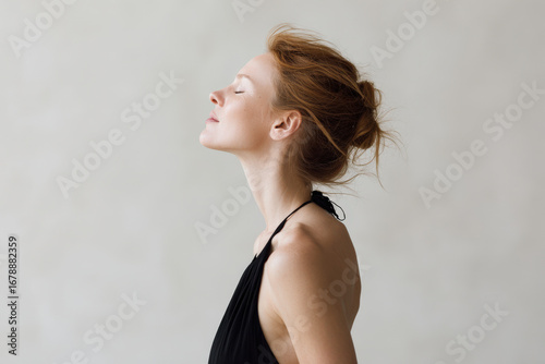woman in static pose focuses on her breathing and mindfulness with her eyes closed