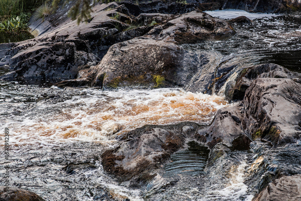 Obraz premium Akhinkoski Waterfalls or Ruskeala Waterfalls on the Tohmajoki River. Russia, Republic of Karelia