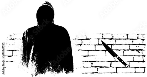 Mysterious hooded figure and knife against brick wall