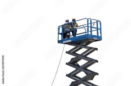 Construction worker wearing safety harnesses in mobile crane bucket at construction site. working at heights above ground ,safety for working at heights concept