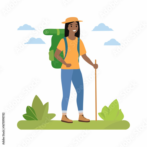 Woman hiker with backpack and walking stick enjoying a scenic outdoor adventure