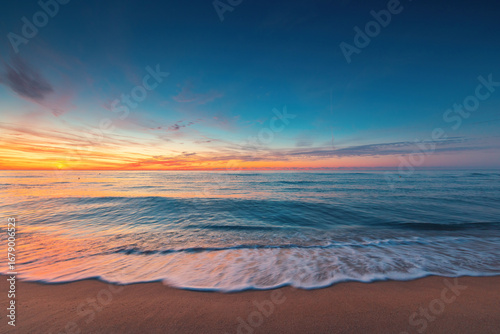 Sunrise Over Ocean sea and Golden Sandy Beach