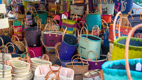 Wallpaper Mural Colorful handmade wicker baskets on sale at local market 
 Torontodigital.ca