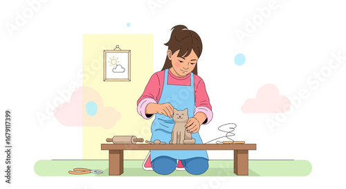 Young Artisan Crafting Adorable Clay Cat Sculpture At A Studio Workshop
