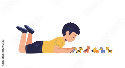 Young Boy Playing With Toy Animals On A White Background Is Enjoying His Time