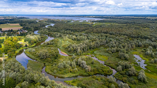 Slika na platnu Aerial drone view of Warta River bends in Jeziorsko nature reserve, dense ripari