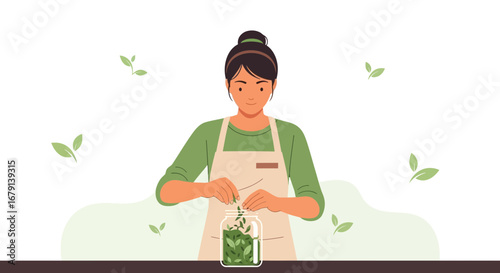 Woman Preserves Fresh Herbs In Glass Jar, Focus On Healthy Lifestyle And Preservation