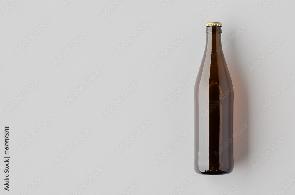 Fototapeta premium Beer bottle mockup with blank copyspace, amber glass