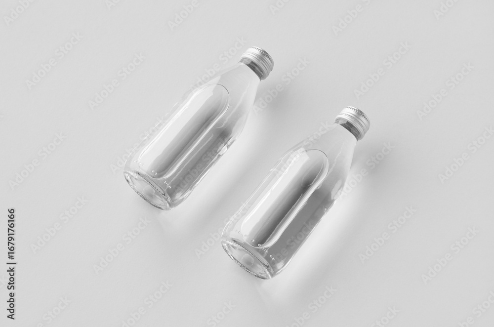 Naklejka premium Small water bottle mockup, clear glass