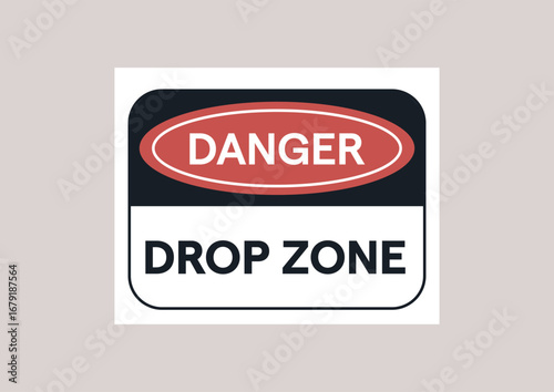 A prominently displayed sign warns of dangers in a designated drop zone, emphasizing the importance of safety in this area where objects may fall or be airborne