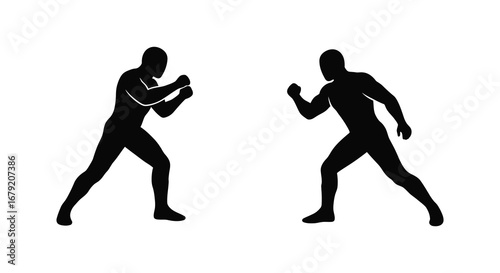 Two Silhouetted Figures in a Fighting Stance Facing Each Other