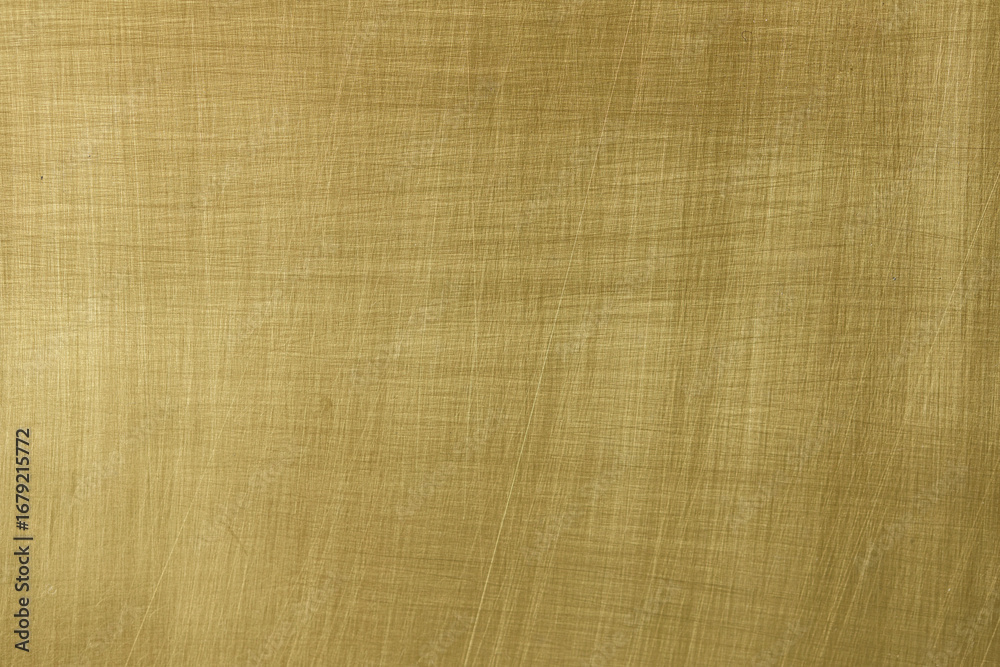 Fototapeta premium High-resolution brushed gold texture. Perfect for backgrounds, website design, and more.