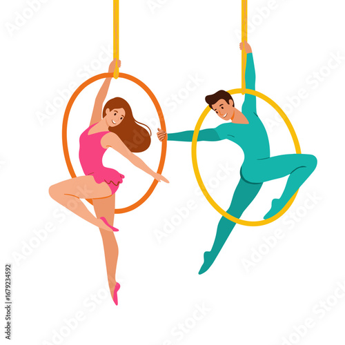 Aerial performers executing tricks in colorful hoops 