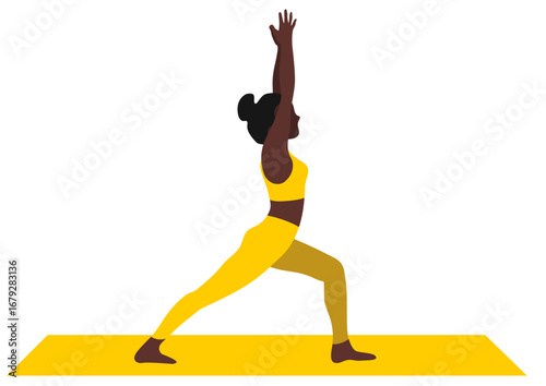 African american woman doing yoga warrior pose on beach. Concept of outdoor fitness activity and wellness. Summer vacation sport.