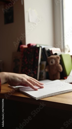 A Hand Writing in a Notebook. A Psychological Technique for Reflection. simple act of flipping a page to start a new one, symbolizing a fresh start or a transition in one's diary. mindfulness