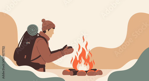 Warmth And Solitude: An Adventurer Warming Up Beside A Campfire In The Wilderness
