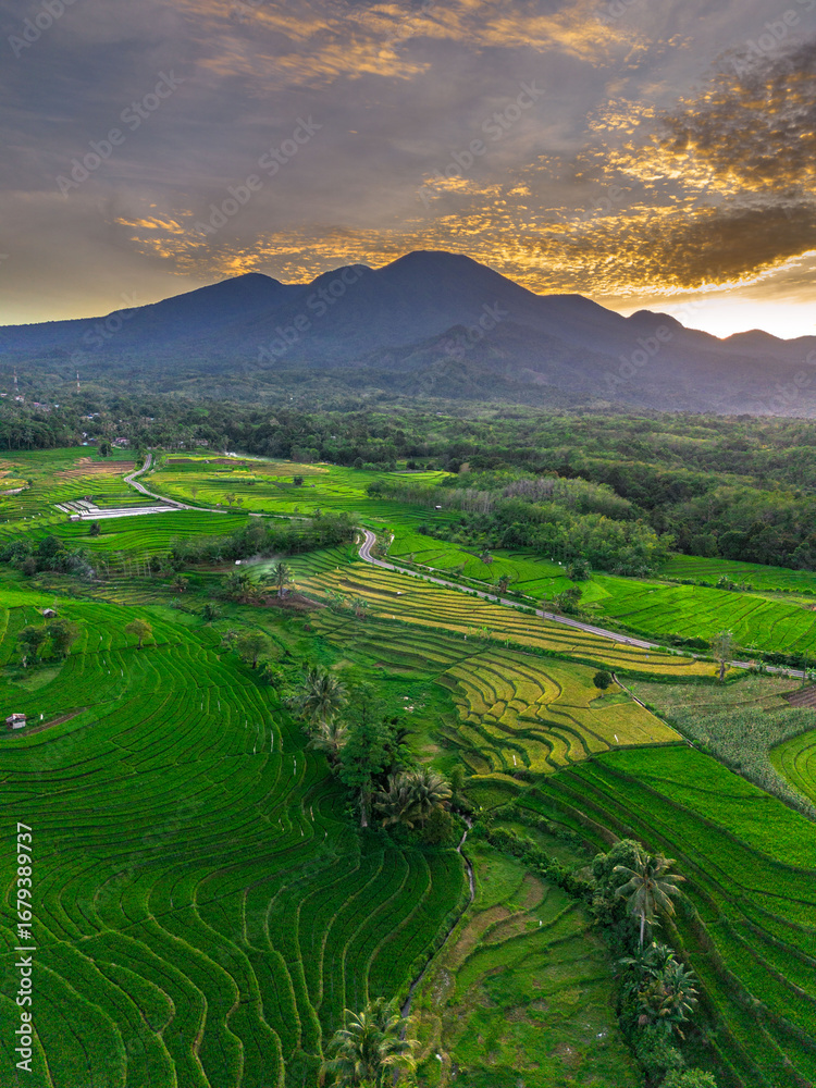 Fototapeta premium Wonderful sunrise scenery indonesia nature mountain valley forest with bright sky