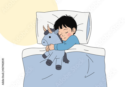 Young boy sleeping peacefully hugging a plush unicorn toy