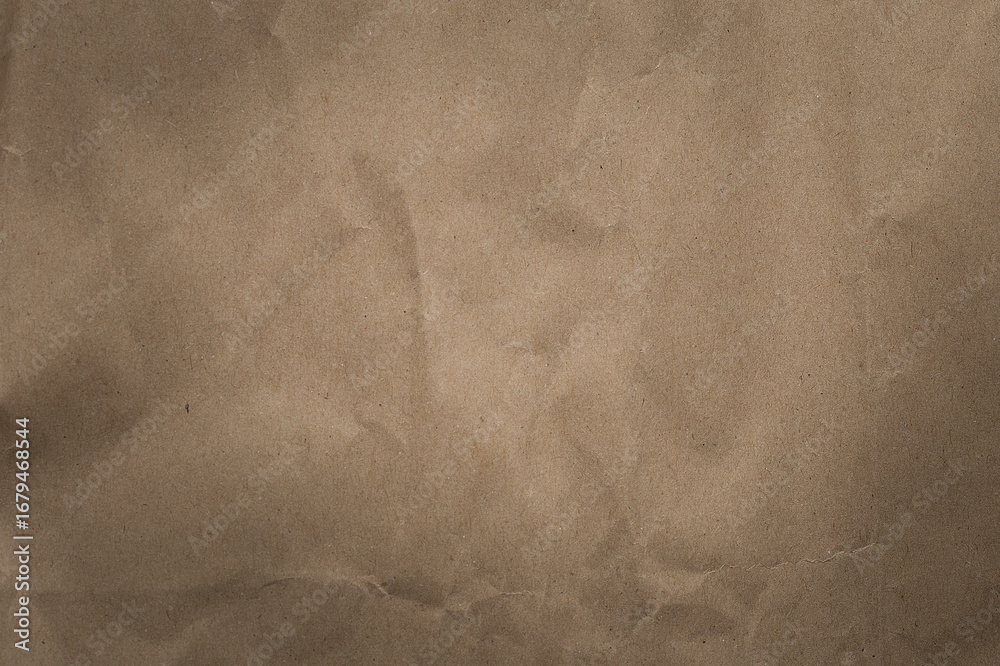 Naklejka premium Old Paper Texture. Brown textured paper background with copy space. A high-resolution image of a vintage, off paper texture