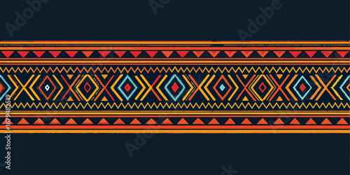 Vibrant geometric tribal pattern with diamond and zigzag motifs in warm colors on dark background
