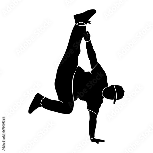 Silhouette of a breakdancer performing a handstand with legs raised in the air