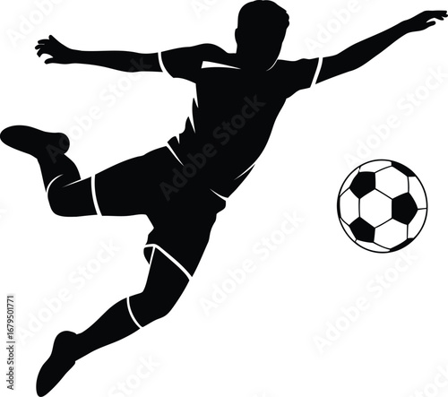 Silhouette of a soccer player kicking a ball in mid air