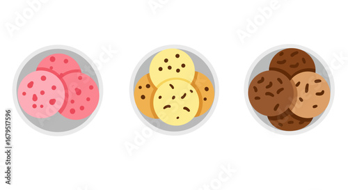 Three oval plates filled with colorful cookies in pink yellow and brown with chocolate chips