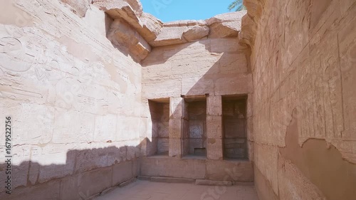 Explore the awe inspiring ancient architecture within the vast Karnak Temple Complex in Luxor, Egypt. This footage captures the intricate details and grand scale of one of the world's largest religiou