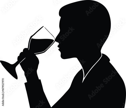 Silhouette of a person smelling a glass of red wine