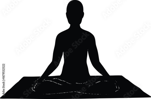 Silhouette of a person meditating in a lotus pose on a mat