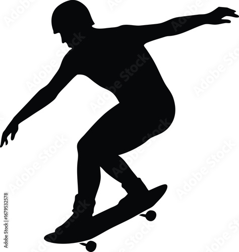 Silhouette of a skateboarder performing a trick