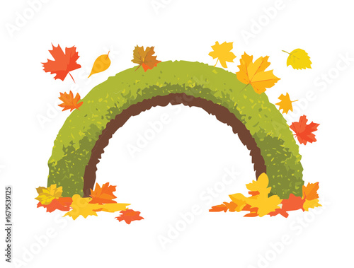 A green hedge archway with colorful autumn leaves scattered around its base, showcasing the beauty of the season