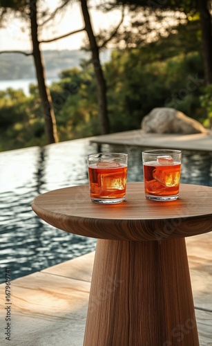 Refreshing Cocktails by the Poolside With Ocean View During Sunset.