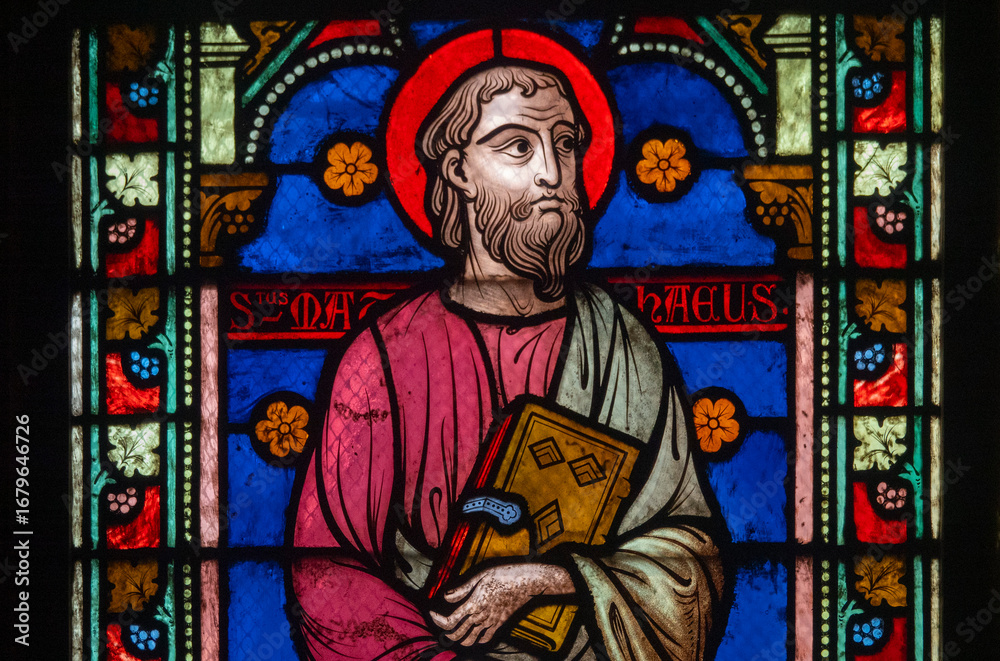 Fototapeta premium Stained glass (19th century) of Saint Matthew the Apostle. Saint of the Roman Catholic Church.