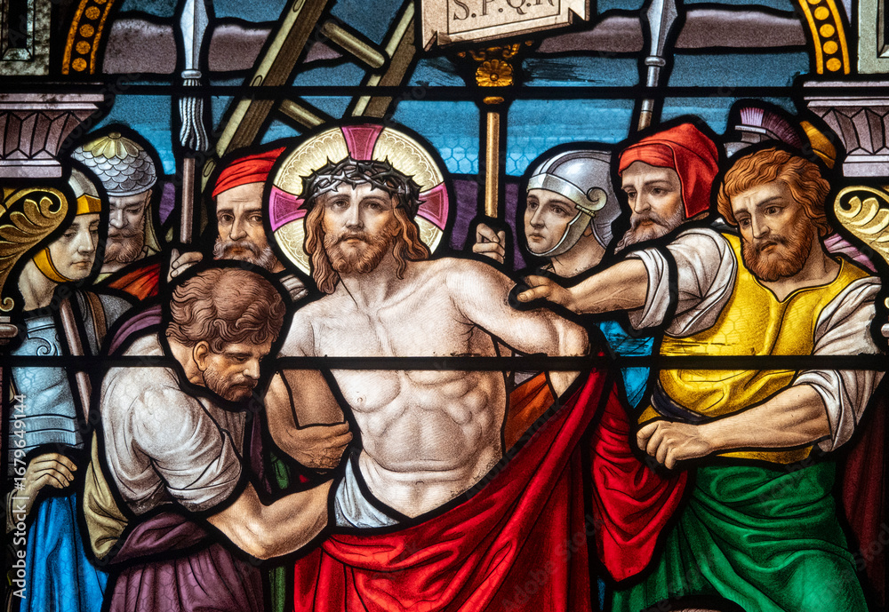 Obraz premium Stained glass (1914) of The Way of the Cross. Tenth station: Jesus is stripped of his clothes.