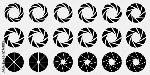 Collection of black camera aperture blades in circular patterns on a light gray background