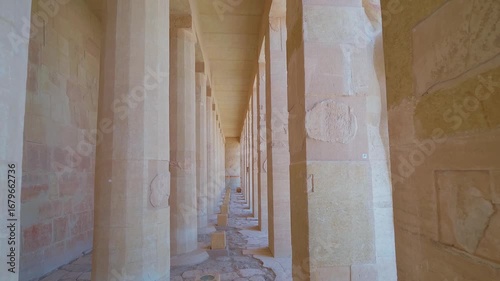 A captivating view inside the Mortuary Temple of Hatshepsut at Deir el Bahari, Luxor, Egypt, showcasing the impressive colonnade and architectural details of this ancient site.