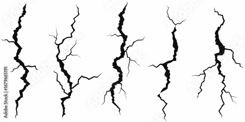 Collection of five distinct black crack graphic elements on a white background