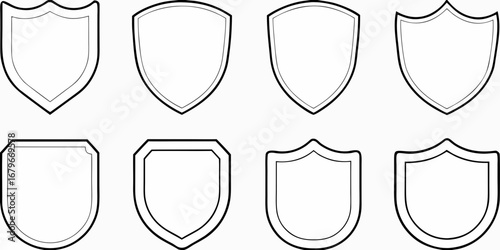 Collection of eight different shield shapes and crest outlines in a simple black and white line drawing style