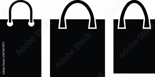 Three black shopping bags with handles displayed side by side on a white background
