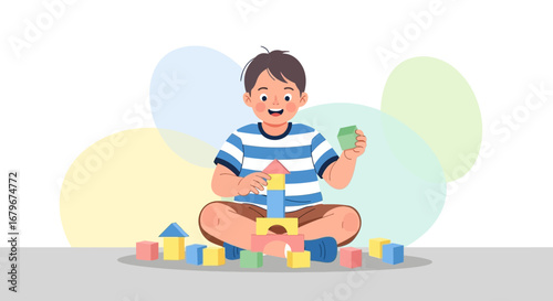 Happy Little Boy Playing with Colorful Building Blocks, Sitting and Constructing