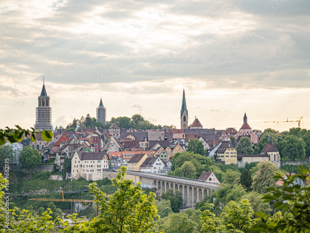 Naklejka premium A city Rottweil in Germany with a bridge and a church in the background