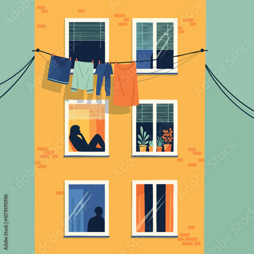 Exterior view of an apartment block with people inside.