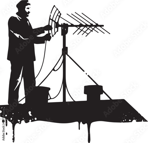 Silhouette of a man adjusting a vintage television antenna on a