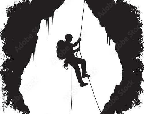 Silhouette of a caver rappelling down a cave entrance adorned wi