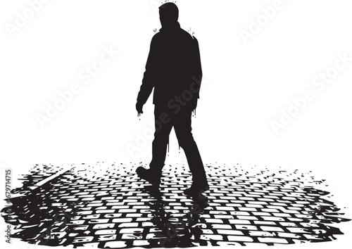 Silhouette of a solitary man walking down a brick pathway in sta