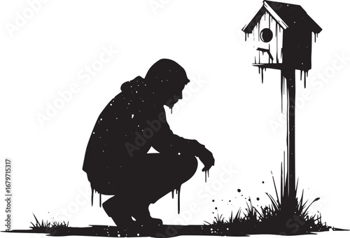 Monochrome Silhouette of a Contemplative Figure Crouching by a B