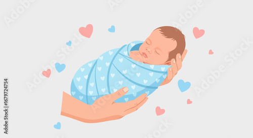 Cute newborn baby wrapped in a light blue blanket with pink and blue hearts